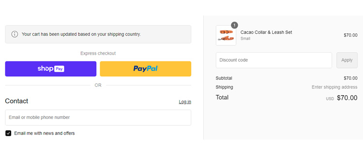 A screenshot of IDoggos checkout page showing a working coupon code 