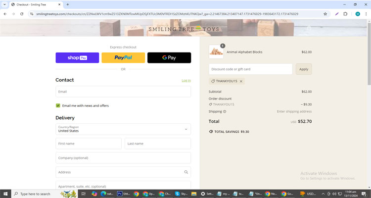 A screenshot of Smiling Tree Toys checkout page of working coupon code  